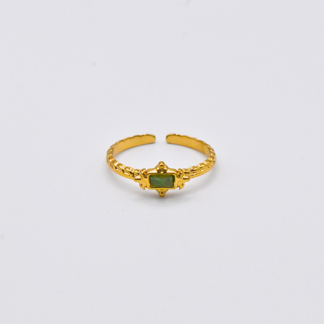 Bague modèle greeny en or pierre verte posée
