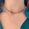 Collier modèle isle necklace en or et pierres marrons  porté